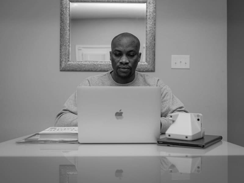 Business owner working alone at his desk